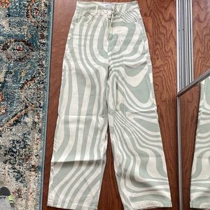 Trendy wide leg swirl jeans